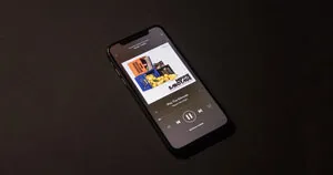Music play through a phone's speakers.