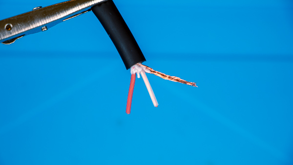 An image of a microphone cable's ground wire, "hot" wire, and "cold" wire.