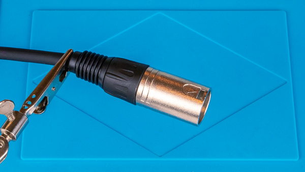 An image of a male XLR connector that has been screwed together.