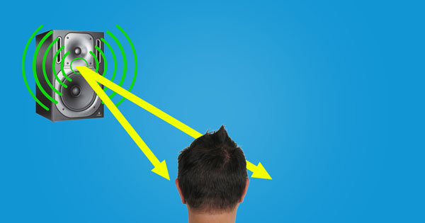 An image of sound waves traveling a shorter distance to reach a person's left ear than a person's right ear, creating a timing difference.