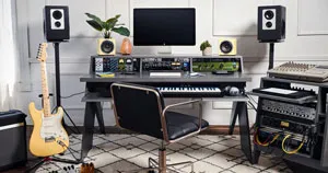 An Output Platform desk being used to house music production gear.