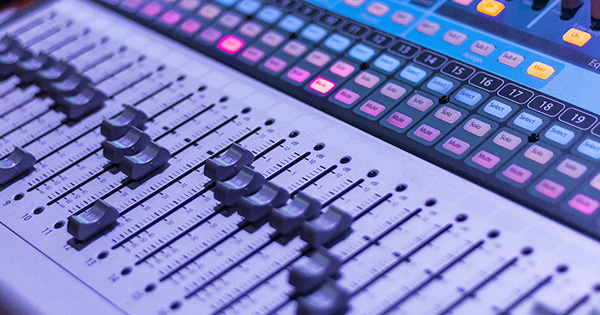 A mixing console used to mix songs.