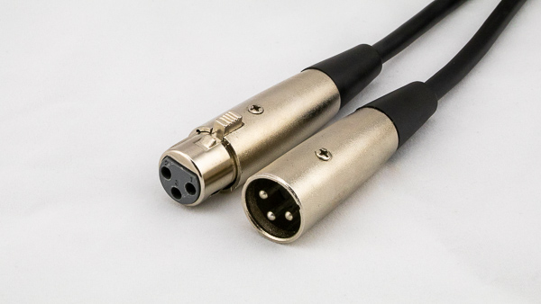 An image of a female XLR connector (left) and male XLR connector (right).