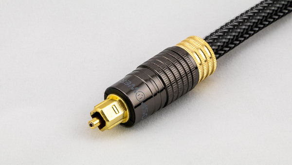 An image of a fiber optic cable with a male TOSLINK connector.